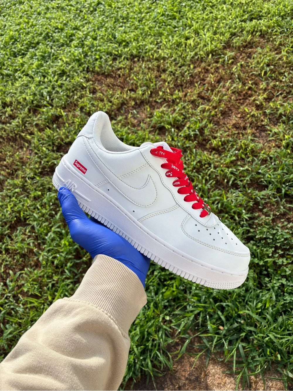 Nike White Leather Sneakers with Red Laces